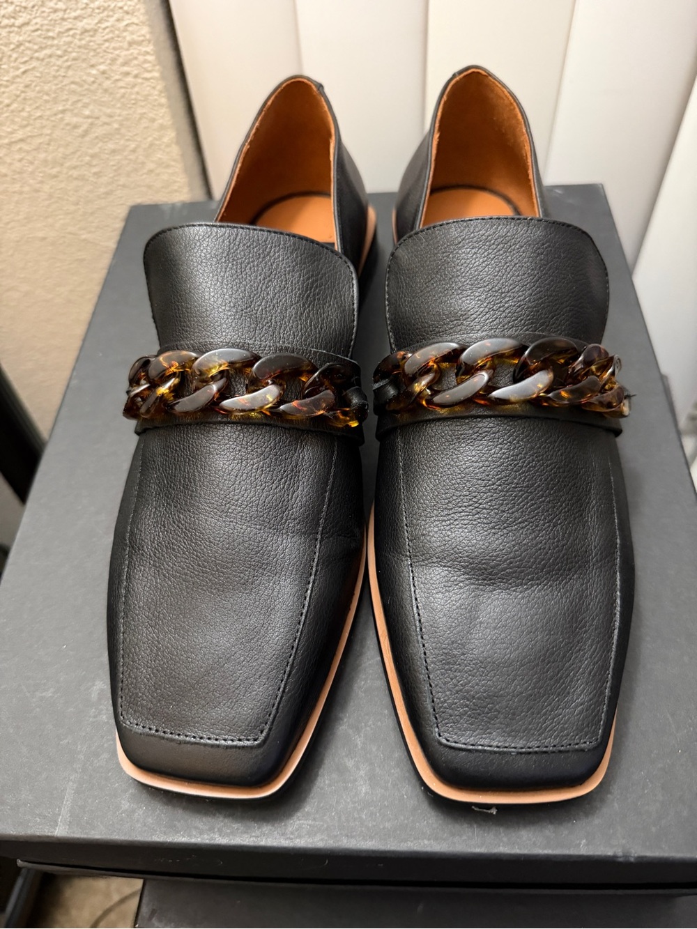 Women’s Black Leather Slip-On Loafers with Tortoiseshell Chain
